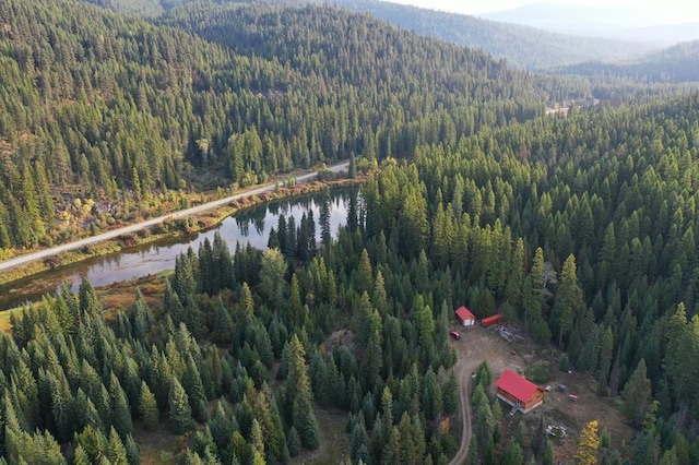 670GUSCREEK Gus Creek Rd, Yaak, MT 59935 - view of property location featuring a heavily wooded area and a water and mountain view