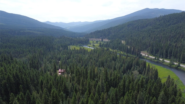 670GUSCREEK Gus Creek Rd, Yaak, MT 59935 - view of mountain backdrop featuring a forest