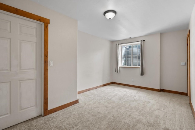 54 Bluebird Dr, Kalispell, MT 59901 - spare room with carpet floors and baseboards