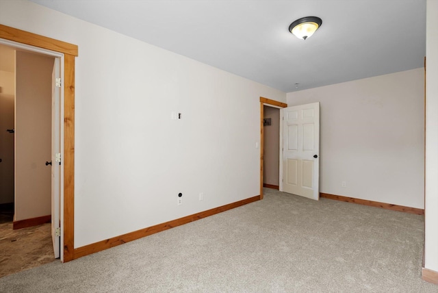 54 Bluebird Dr, Kalispell, MT 59901 - carpeted empty room featuring baseboards