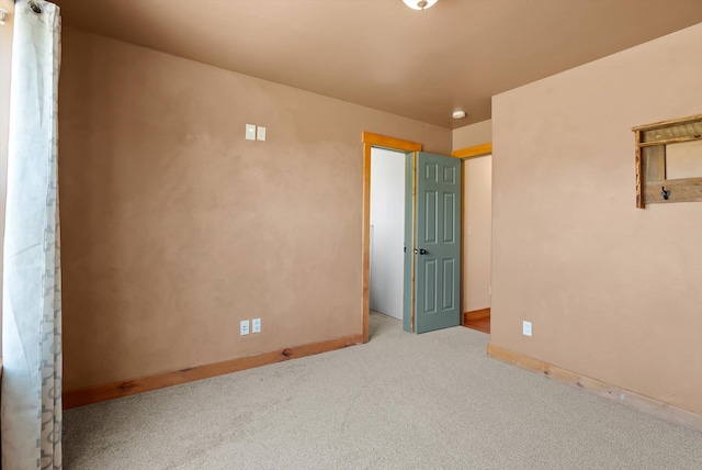 54 Bluebird Dr, Kalispell, MT 59901 - unfurnished bedroom with carpet flooring and baseboards