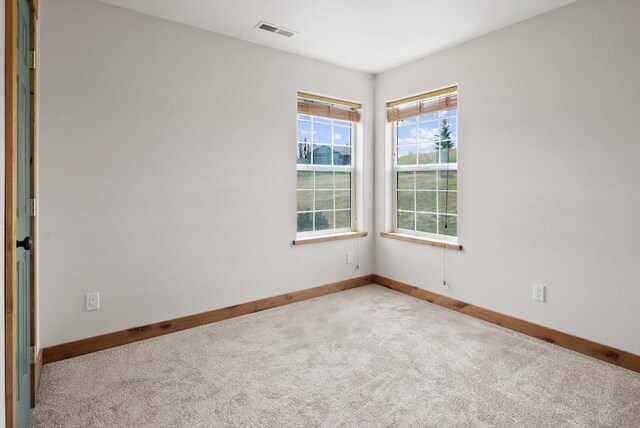 54 Bluebird Dr, Kalispell, MT 59901 - carpeted spare room featuring baseboards