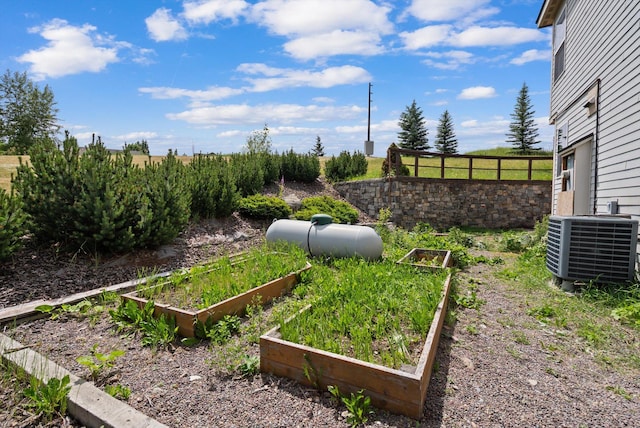 54 Bluebird Dr, Kalispell, MT 59901 - view of yard featuring a vegetable garden