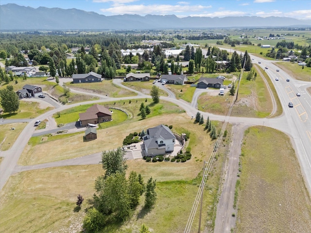 54 Bluebird Dr, Kalispell, MT 59901 - view of property location with a mountain backdrop and nearby suburban area