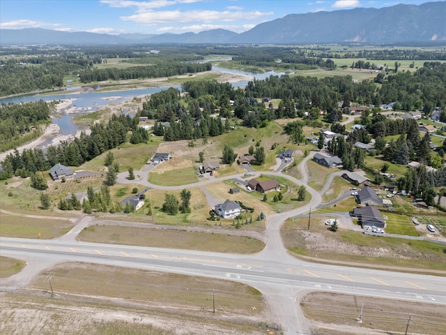 54 Bluebird Dr, Kalispell, MT 59901 - aerial view of property and surrounding area featuring a water and mountain view