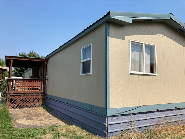412 N Surrey St, Missoula, MT 59808 - view of home's exterior with a wooden deck