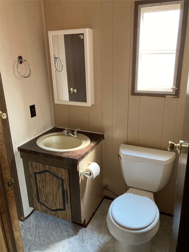 412 N Surrey St, Missoula, MT 59808 - bathroom with vanity and a decorative wall