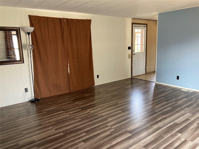 412 N Surrey St, Missoula, MT 59808 - empty room with wood finished floors and baseboards