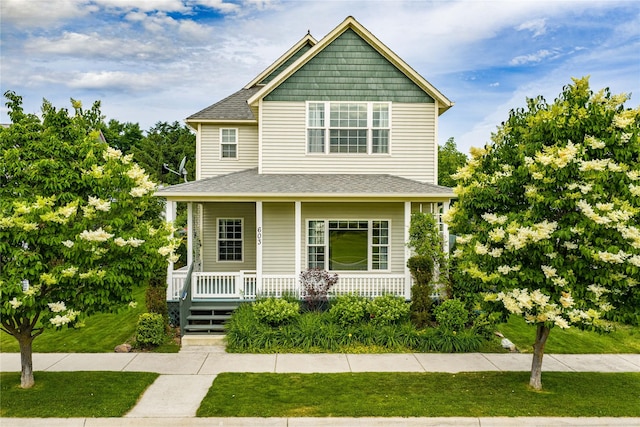 603 Luella Ln, Missoula, MT 59801 - view of front of property featuring a porch, a front yard, and roof with shingles