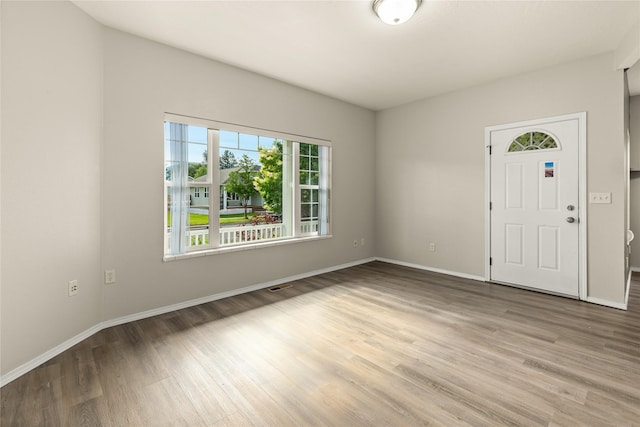 603 Luella Ln, Missoula, MT 59801 - spare room with wood finished floors and baseboards