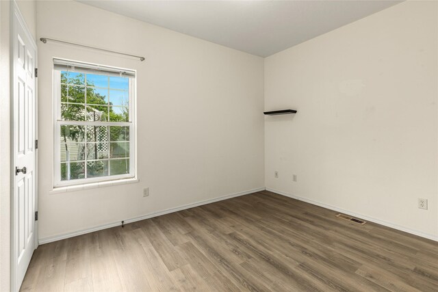 603 Luella Ln, Missoula, MT 59801 - unfurnished room featuring wood finished floors and baseboards
