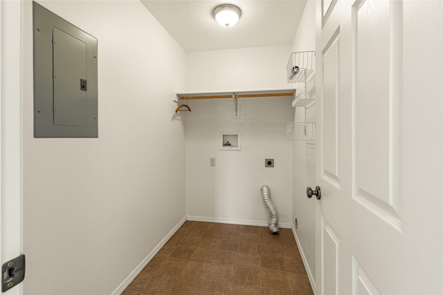 603 Luella Ln, Missoula, MT 59801 - laundry area with electric dryer hookup, electric panel, dark flooring, and washer hookup