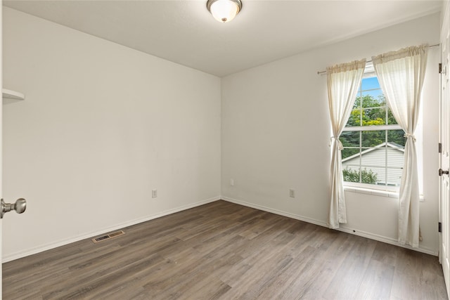 603 Luella Ln, Missoula, MT 59801 - spare room featuring wood finished floors and baseboards