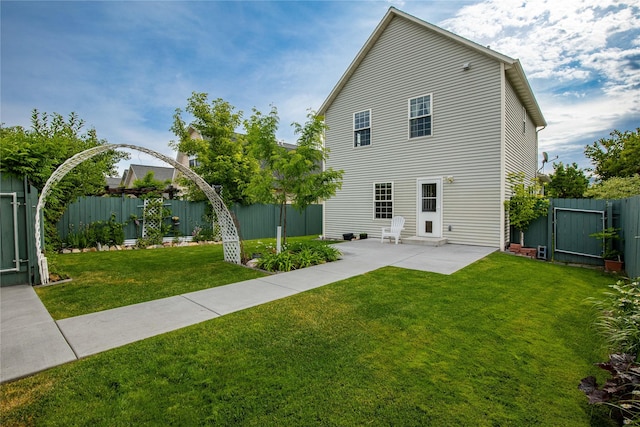 603 Luella Ln, Missoula, MT 59801 - rear view of house featuring a fenced backyard and a patio