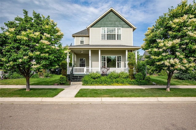 603 Luella Ln, Missoula, MT 59801 - view of front of house featuring a porch and a front yard