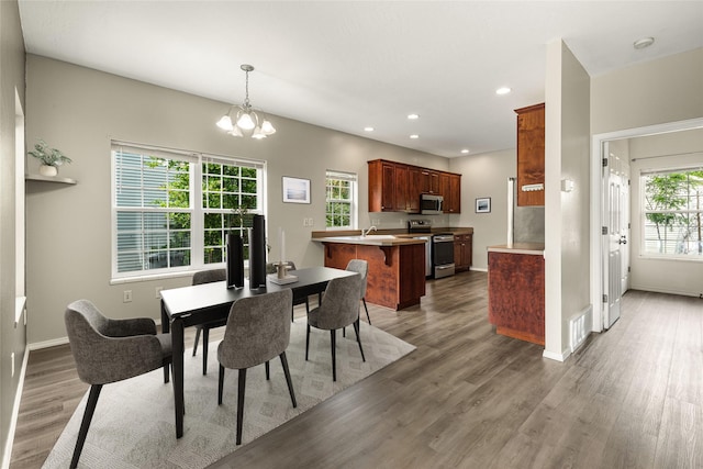 603 Luella Ln, Missoula, MT 59801 - dining space featuring light wood-style flooring, recessed lighting, and a chandelier