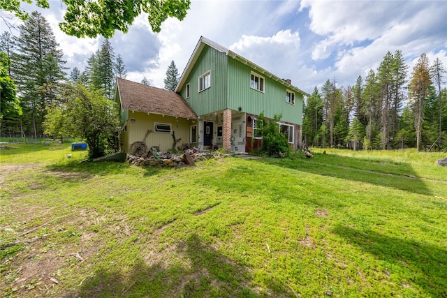 38534 US Highway 2, Libby, MT 59923 - rear view of property with a lawn