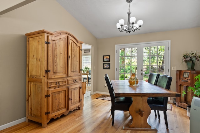4280 Fox Farm Rd, Missoula, MT 59802 - dining room featuring a chandelier, vaulted ceiling, light wood finished floors, and french doors
