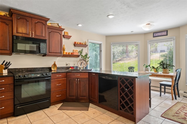 4280 Fox Farm Rd, Missoula, MT 59802 - kitchen with black appliances, plenty of natural light, open shelves, a peninsula, and recessed lighting