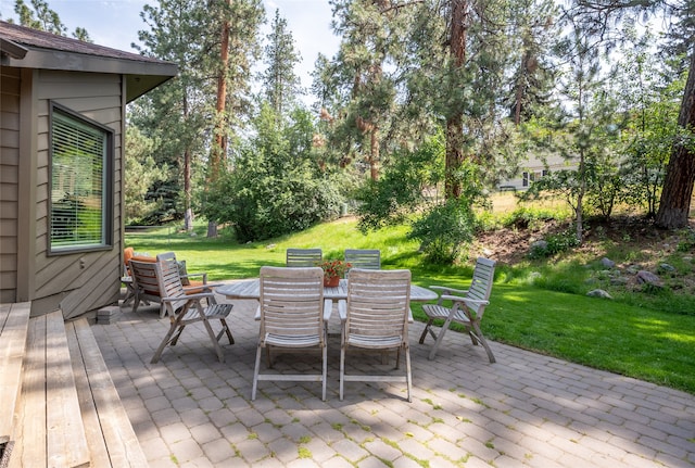 4280 Fox Farm Rd, Missoula, MT 59802 - deck featuring a lawn, a patio area, and outdoor dining area