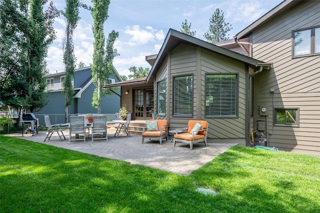 4280 Fox Farm Rd, Missoula, MT 59802 - back of house featuring a patio, a yard, and french doors