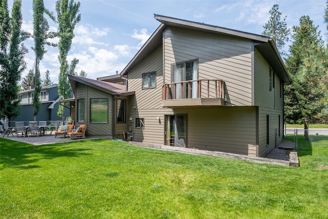 4280 Fox Farm Rd, Missoula, MT 59802 - back of house featuring a balcony and a patio
