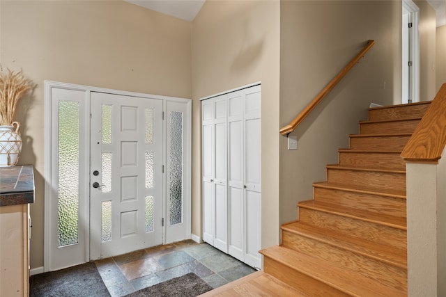 4280 Fox Farm Rd, Missoula, MT 59802 - foyer featuring stairs and stone finish floors