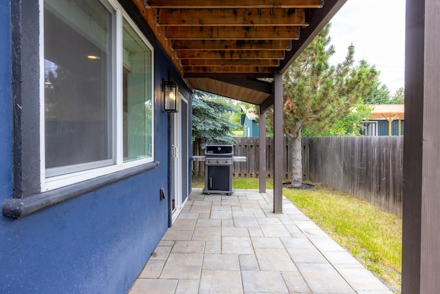 441 Karrow Ave, Whitefish, MT 59937 - fenced backyard featuring area for grilling and a patio area