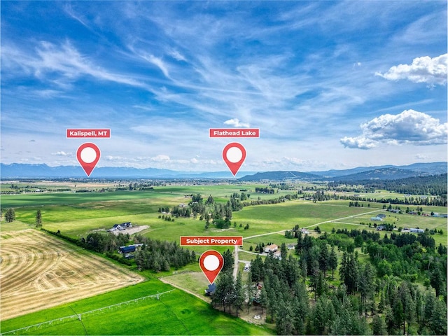 378 Last Best Pl, Kalispell, MT 59901 - aerial view of sparsely populated area featuring a mountainous background