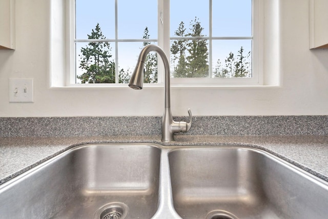 378 Last Best Pl, Kalispell, MT 59901 - kitchen view of a sink and white cabinetry
