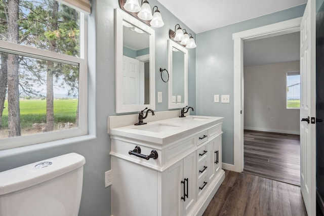 378 Last Best Pl, Kalispell, MT 59901 - bathroom featuring wood finished floors and double vanity