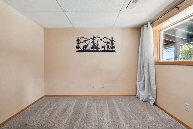 378 Last Best Pl, Kalispell, MT 59901 - carpeted spare room with a paneled ceiling and baseboards