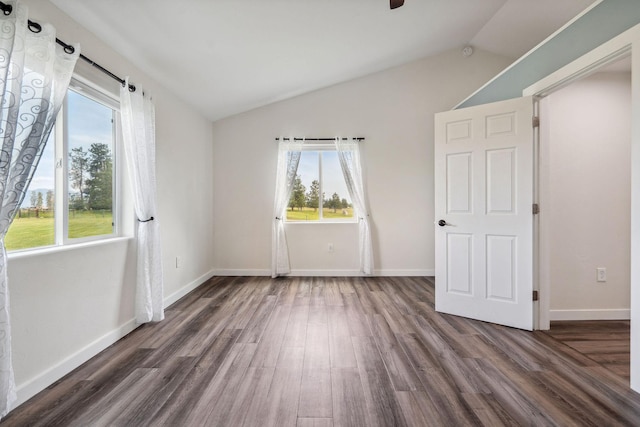 378 Last Best Pl, Kalispell, MT 59901 - unfurnished bedroom featuring wood finished floors and vaulted ceiling