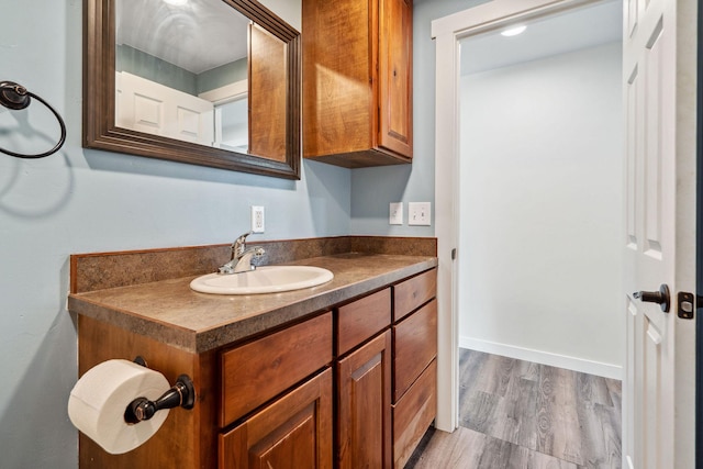 378 Last Best Pl, Kalispell, MT 59901 - bathroom featuring vanity and wood finished floors