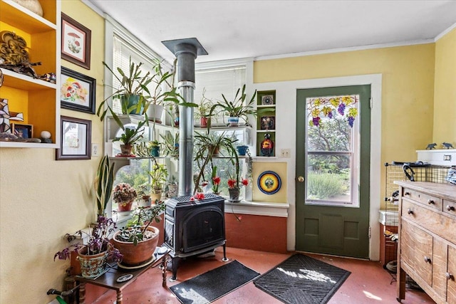 407 1st Ave W, Eureka, MT 59917 - entrance foyer with a wood stove and ornamental molding