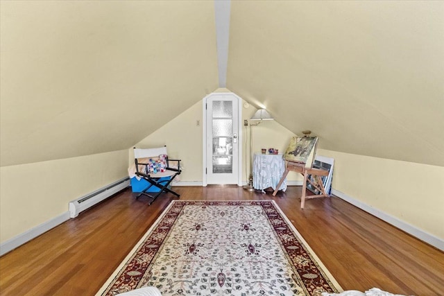 407 1st Ave W, Eureka, MT 59917 - additional living space featuring baseboard heating, wood finished floors, and vaulted ceiling