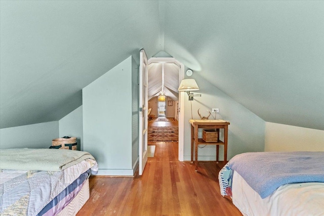 407 1st Ave W, Eureka, MT 59917 - bedroom with wood finished floors and lofted ceiling