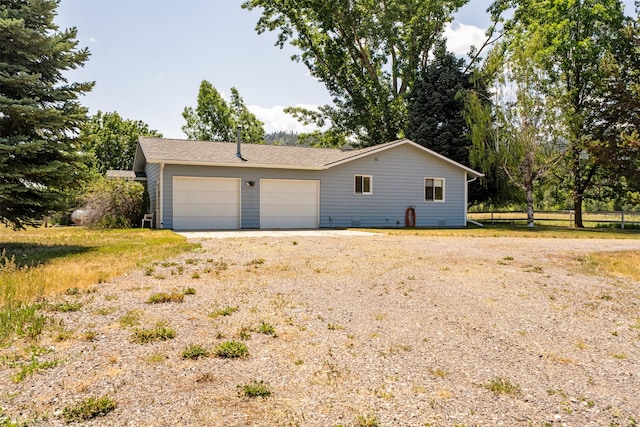 14470 Harpers Bridge Rd, Missoula, MT 59808 - view of property exterior featuring driveway