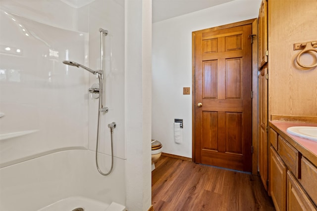 14470 Harpers Bridge Rd, Missoula, MT 59808 - bathroom with wood finished floors, walk in shower, and vanity