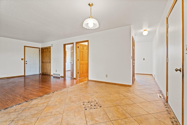 14470 Harpers Bridge Rd, Missoula, MT 59808 - spare room with light tile patterned floors