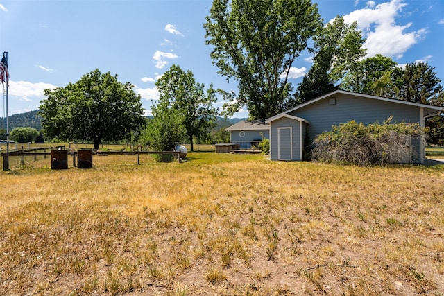 14470 Harpers Bridge Rd, Missoula, MT 59808 - view of yard featuring a storage unit