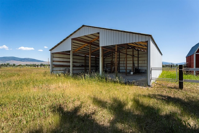 14470 Harpers Bridge Rd, Missoula, MT 59808 - view of pole building with a mountain view and a view of rural / pastoral area