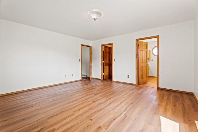 14470 Harpers Bridge Rd, Missoula, MT 59808 - empty room with light wood finished floors and baseboards