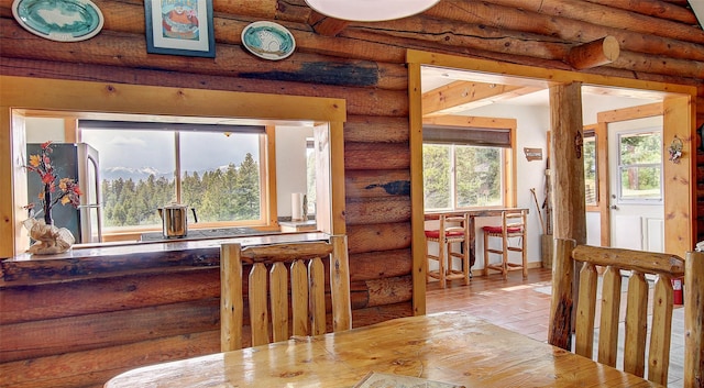 18998 Oris Ln, Florence, MT 59833 - dining room featuring rustic walls