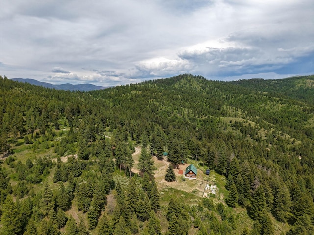 18998 Oris Ln, Florence, MT 59833 - drone / aerial view of a heavily wooded area and mountains