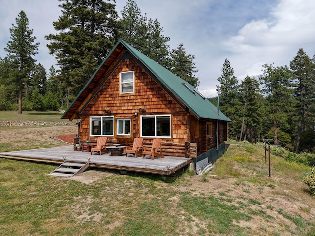 18998 Oris Ln, Florence, MT 59833 - back of property with a deck and a yard
