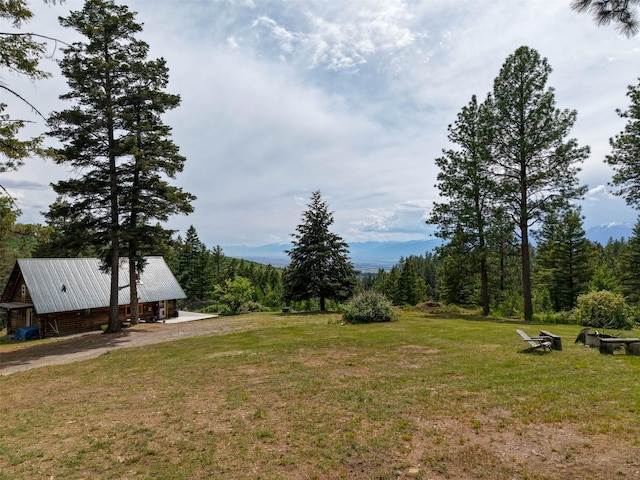 18998 Oris Ln, Florence, MT 59833 - view of green lawn with a forest view