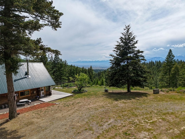 18998 Oris Ln, Florence, MT 59833 - view of grassy yard featuring a wooded view