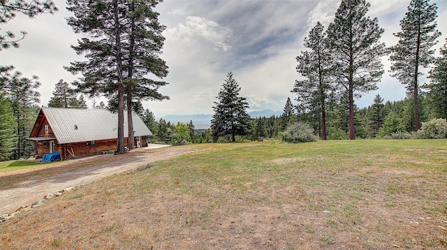 18998 Oris Ln, Florence, MT 59833 - view of grassy yard with a view of trees