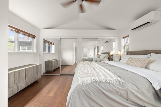 443 Karrow Ave, Whitefish, MT 59937 - bedroom with radiator heating unit, multiple closets, a wall mounted AC, lofted ceiling, and dark wood finished floors